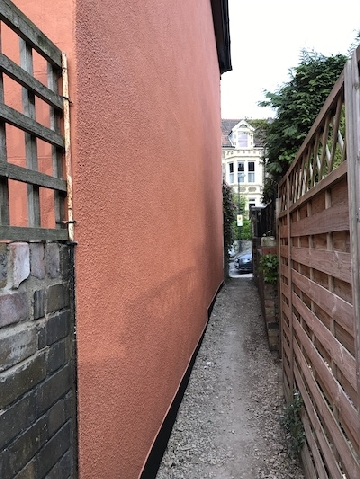 Painting and decorating in Gloucester-Orange wall.
