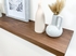 Thick modern softened edge walnut floating shelf